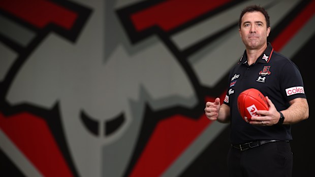 Brad Scott poses for the first time in black and red.