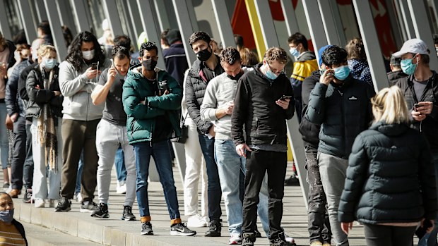 People lining up outside the Melbourne Exhibition Centre Vaccine Hub