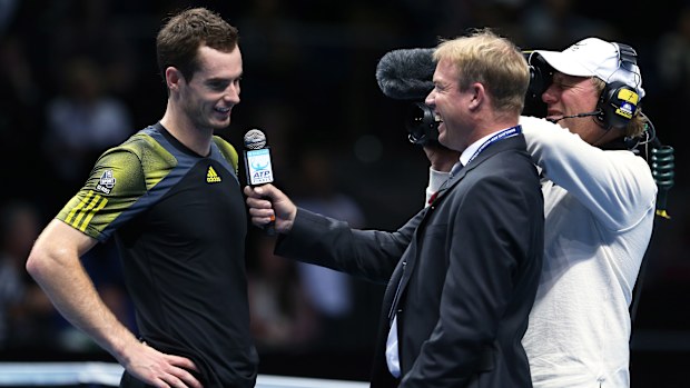 Andy Murray of Great Britain is interviewed by Mark Petchey.