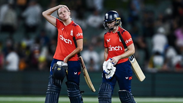 Lauren Filer and Linsey Smith of England leaves the ground after the last wicket during game three of the T20 International Women's Ashes series at Adelaide Oval on January 25, 2025 in Adelaide, Australia. (Photo by Mark Brake/Getty Images)