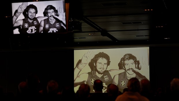 A pictorial tribute is shown during Robert Walls Funeral Service