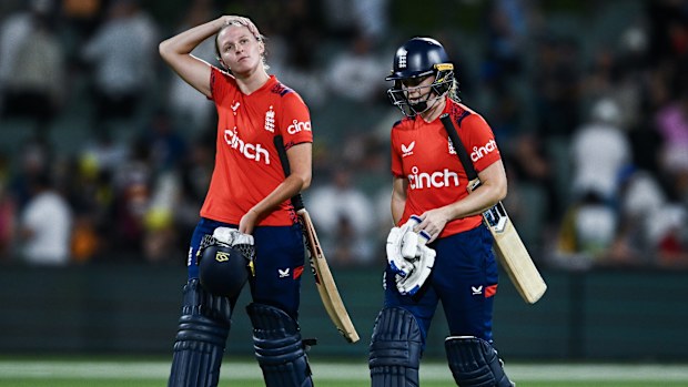 Lauren Filer and Linsey Smith of England leaves the ground after the last wicket during game three of the T20 International Women's Ashes series at Adelaide Oval on January 25, 2025 in Adelaide, Australia. (Photo by Mark Brake/Getty Images)