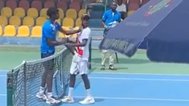 Michael Kouame slaps opponent Raphael Nii Ankrah.