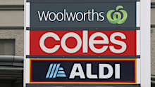 Generic photo of signage of supermarkets Woolworths, Coles and Aldi, seen in Ashfield, NSW, on Tuesday 8 April 2025. Photo: Alex Ellinghausen
