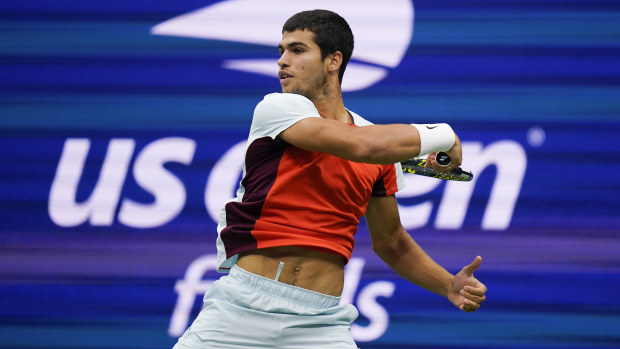 Carlos Alcaraz, of Spain returns a shot to Casper Ruud, of Norway, during the men's singles final of the U.S. Open tennis championships, Sunday, Sept. 11, 2022, in New York. (AP Photo/Charles Krupa)