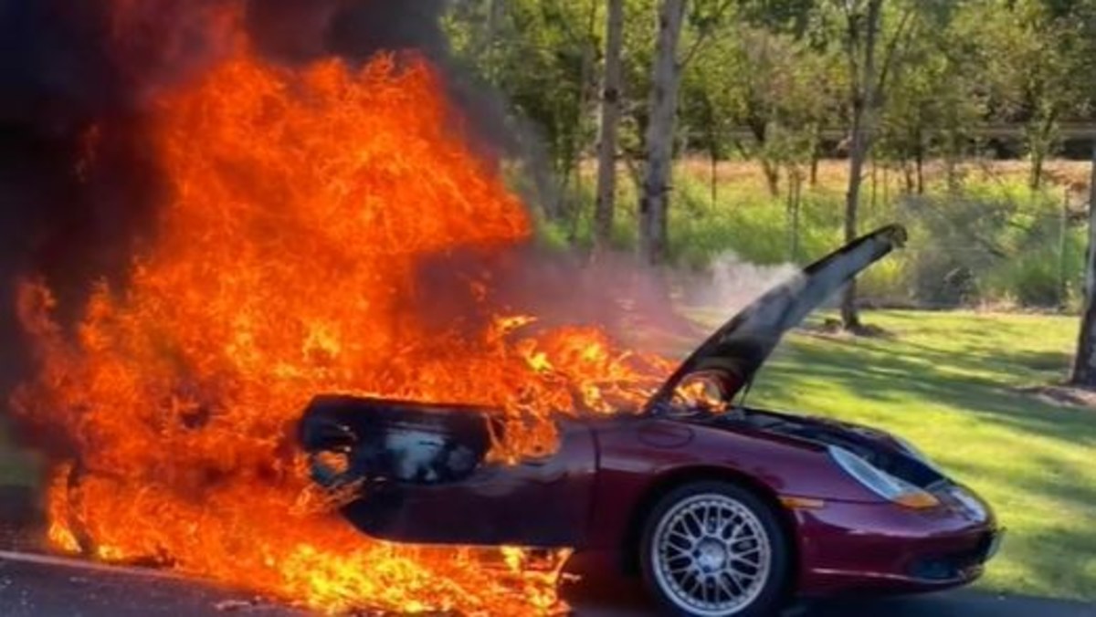 Luxury sports car goes up in flames on Queensland road | Nine.com.au