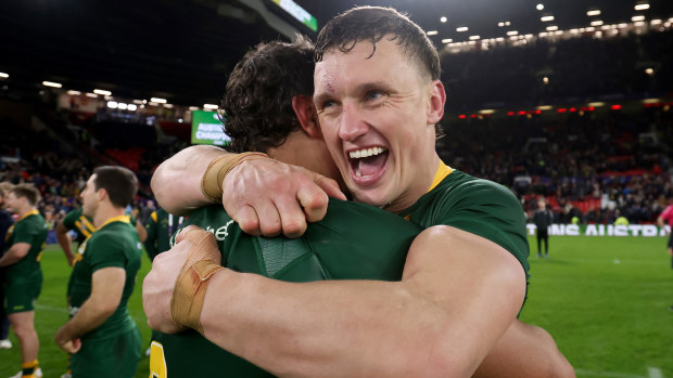 Jack Wighton and Latrell Mitchell celebrate Australia's victory in the World Cup final in 2022.