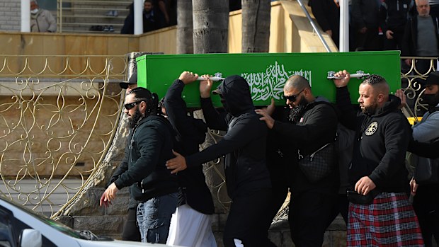 Men carry the coffin of Bilal Hamze after the funeral at Lakemba Mosque. Bilal Hamze funeral