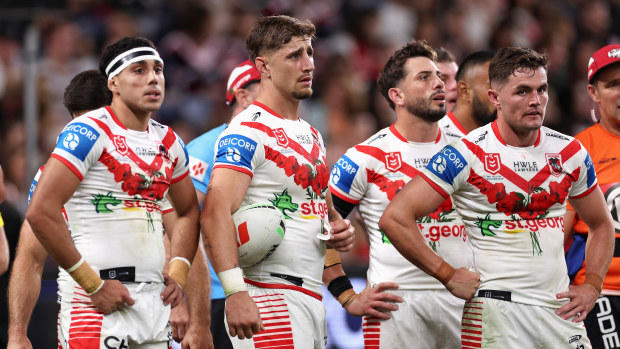 Dragons players look dejected during the loss to the Roosters.