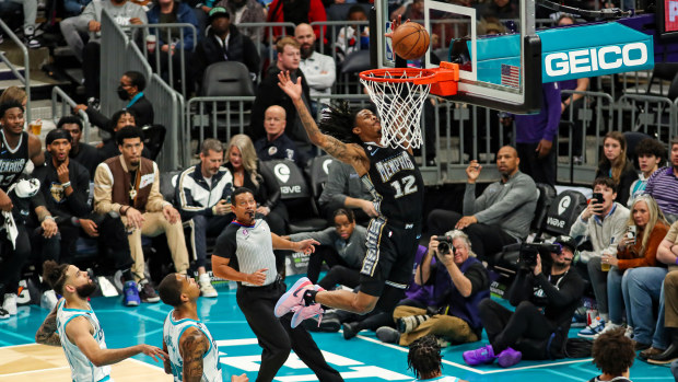 Ja Morant #12 of the Memphis Grizzlies drives to the basket during the game against the Charlotte Hornets on January 4, 2023 at Spectrum Center in Charlotte, North Carolina. (Photo by Brock Williams-Smith/NBAE via Getty Images)