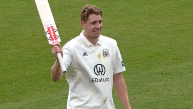 Cameron Green raises the bat.