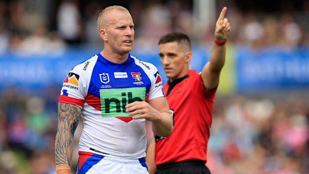 Mitchell Barnett of the Knights is sent off following his elbow on Chris Smith.