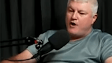 Cricket great Stuart MacGill berates podcast host Andrew Menczel.