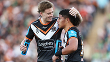 Luke Laulilii of the Tigers celebrates with Lachlan Galvin.