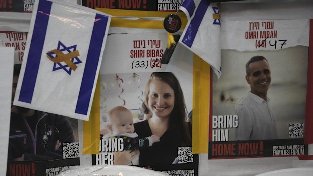 A poster shows Shiri Bibas, who was kidnapped to Gaza with her husband and two young sons on Oct. 7, 2023, in Jerusalem, Friday, Feb. 21, 2025. (AP Photo/Mahmoud Illean)