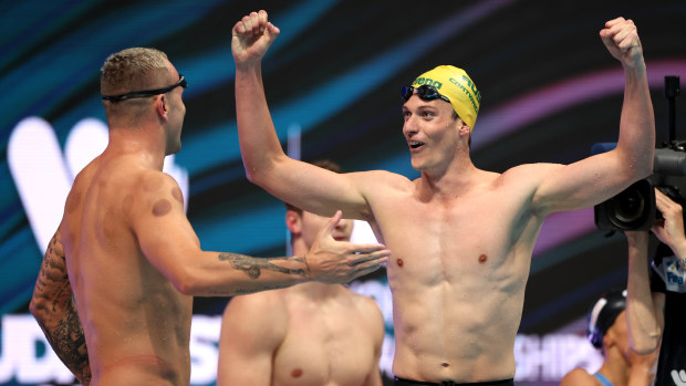 Kyle Chalmers and Jack Cartwright celebrate after setting a new world record.