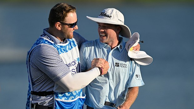 oe Highsmith and his caddie, Joe LaCava Jr., celebrate on the 18th green together during the final round of The Cognizant Classic in The Palm Beaches at PGA National Resort the Champion Course on March 2, 2025 in Palm Beach Gardens, Florida. (Photo by Ben Jared/PGA TOUR via Getty Images)