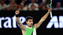 Carlos Alcaraz celebrates a hard-fought opening win over local hope Adam Walton at the 2026 Australian Open.