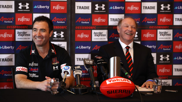 Newly appointed Bombers coach Brad Scott and club president David Barham address the media.