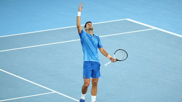 Novak Djokovic of Serbia celebrates winning championship point in the Mens Singles Final against Stefanos Tsitsipas of Greece during day 14 of the 2023 Australian Open at Melbourne Park on January 29, 2023 in Melbourne, Australia. (Photo by Graham Denholm/Getty Images)