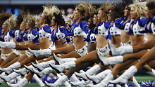 ARLINGTON, TEXAS - JANUARY 16: The Dallas Cowboys Cheerleaders perform prior to a game against the San Francisco 49ers in the NFC Wild Card Playoff game at AT&T Stadium on January 16, 2022 in Arlington, Texas. (Photo by Tom Pennington/Getty Images)