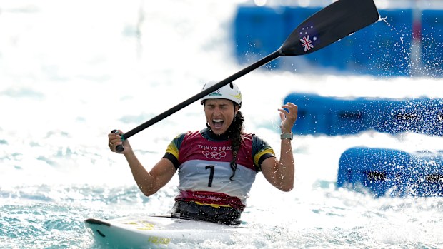 Jessica Fox of Australia celebrates as she crosses the finish line to win gold in the Women's C1 of the Canoe Slalom.