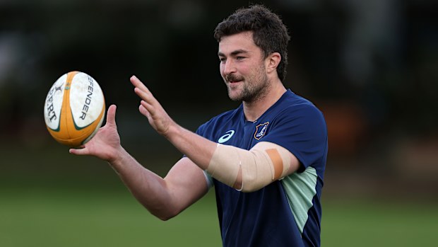 Jeremy Williams handles the ball during a Wallabies training session at David Phillips Sports Complex.