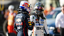 Max Verstappen and Oscar Piastri congratulate each other in parc fermé after sprint qualifying ahead of the US Grand Prix.