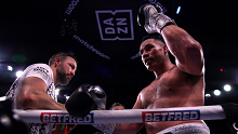 Joseph Parker and trainer Andy Lee after the WBO Intercontinental Heavyweight Title victory against Derek Chisora.