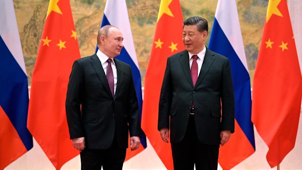 Chinese President Xi Jinping, right, and Russian President Vladimir Putin pose for a photo prior to their talks in Beijing, China, Friday, Feb. 4, 2022. Russian President Vladimir Putin is in Beijing for the Winter Olympics and talks with his Chinese counterpart Xi Jinping, amid soaring tensions with Ukraine.