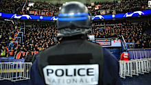 Riot police before a match between Paris Saint-Germain and AC Milan.