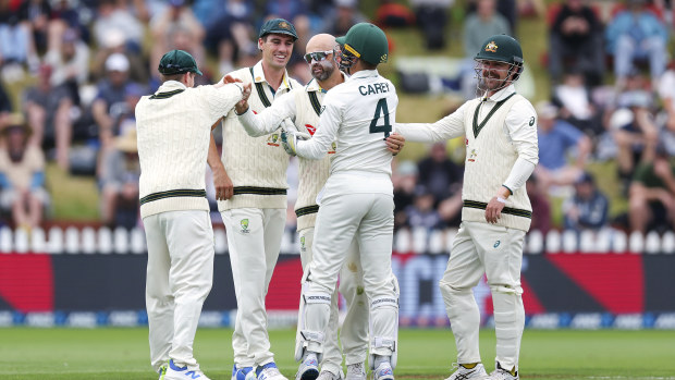 Nathan Lyon of Australia celebrates after taking the wicket of Glenn Phillips of New Zealand for a five wicket bag during day four of the First Test in the series between New Zealand and Australia at Basin Reserve on March 03, 2024 in Wellington, New Zealand. (Photo by Hagen Hopkins/Getty Images)