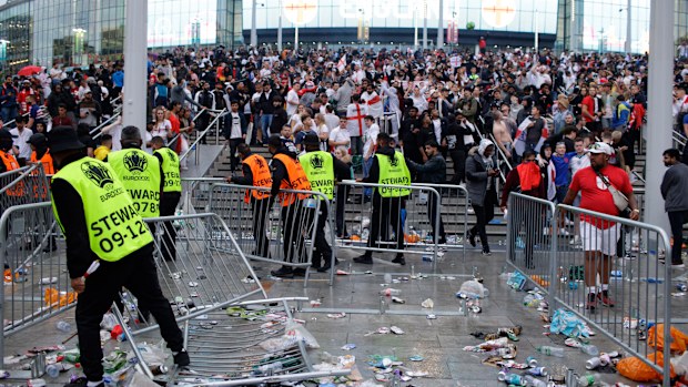 Hundreds of ticketless fans got into Wembley and fought with stewards after areas around the stadium became packed hours before the Euro 2020 final kicked off.