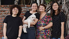 Lindy Cleeland, 67, with some of the travellers she has hosted on Abroadly.