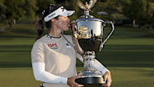 Hannah Green poses with the trophy.