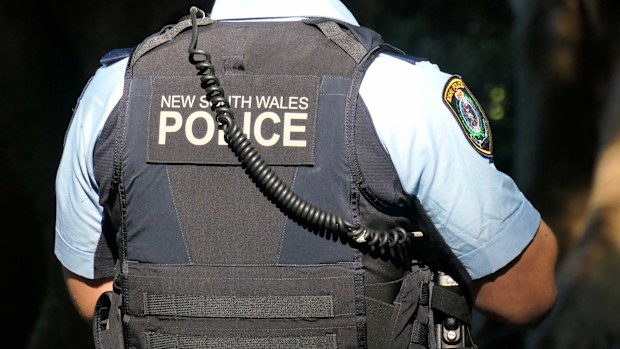 NSW police have arrested a man after a gunshot was fired at a unit on the Central Coast.
