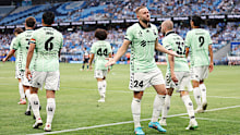 Michael Ruhs celebrates scoring the winner against Sydney FC.