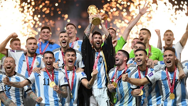 Lionel Messi of Argentina lifts the FIFA World Cup Qatar 2022 Winner's Trophy after the FIFA World Cup Qatar 2022 Final match between Argentina and France at Lusail Stadium on December 18, 2022 in Lusail City, Qatar. (Photo by Shaun Botterill - FIFA/FIFA via Getty Images)