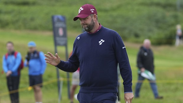 Marc Leishman of South Africa, acknowledges the crowd after getting a birdie on the 12th green during the second round of the British Open golf championship at the Royal Portrush Golf Club, Northern Ireland, Friday, July 18, 2025. (AP Photo/Jon Super)