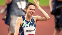 Russia's Mariya Lasitskene reacts after winning the gold medal in the high jump at the Tokyo 2020 Summer Olympic Games. 
