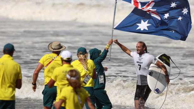 Owen Wright of Australia celebrates winning his men's Bronze Medal match against Gabriel Medina of Brazil.