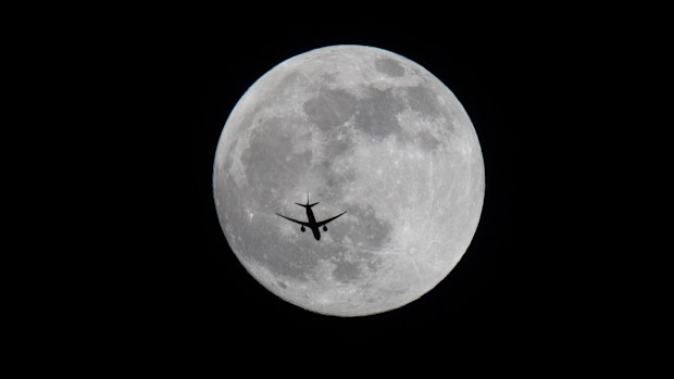 The full moon seen shining over Basra, Iraq.