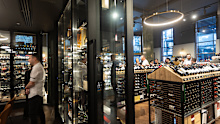 Dan Murphy's opens luxury liquor store at site of former Lindt Cafe in Martin Place 