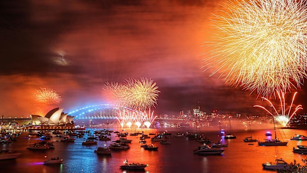 Fireworks light up the sky over Sydney Harbour Bridge during New Year's Eve celebration on January 01, 2023 in Sydney, Australia.