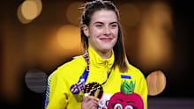BELGRADE, SERBIA - MARCH 19: Gold Medallist Yaroslava Mahuchikh of Ukraine celebrates after winning the Women's High Jump Final during Day Two of the World Athletics Indoor Championships at Belgrade Arena on March 19, 2022 in Belgrade, Serbia. (Photo by Alex Pantling/Getty Images)