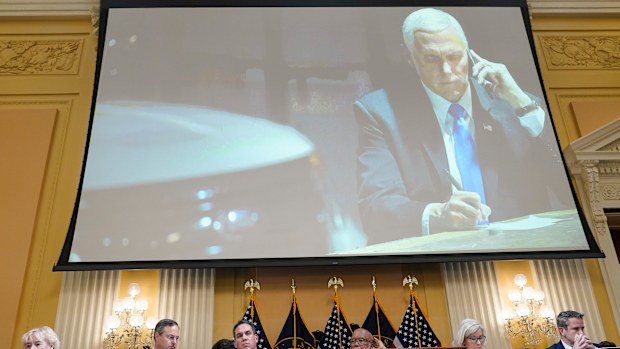A committee exhibit shows former Vice President Mike Pence talking on the phone from his secure location during the riot, as the House select committee investigating the Jan. 6, 2021, attack on the Capitol holds a hearing at the Capitol in Washington, Thursday, June 16, 2022. (AP Photo/Susan Walsh)