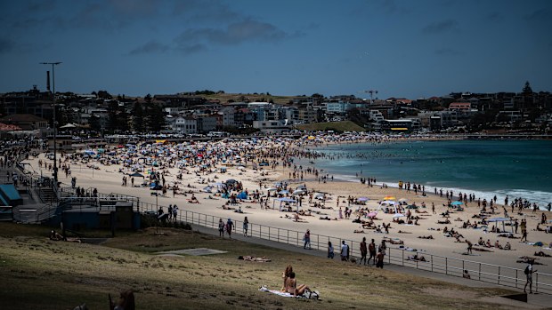 Beachgoers are seen at Bondi Beach in Sydney.