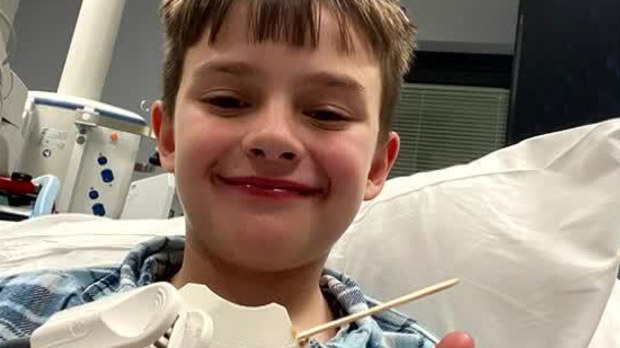 A nine-year-old boy has made an incredible escape after a fire started while he was home on his own.Christian Daubney smashed the front window of the two-storey townhouse with a metal pole to escape.