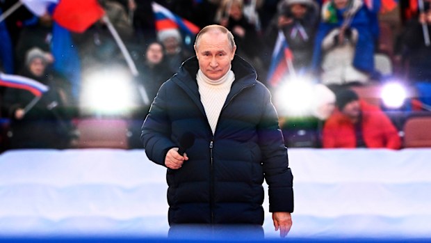 Russian President Vladimir Putin delivers his speech at the concert marking the eighth anniversary of the referendum on the state status of Crimea and Sevastopol and its reunification with Russia, in Moscow, Russia, Friday, March 18, 2022.