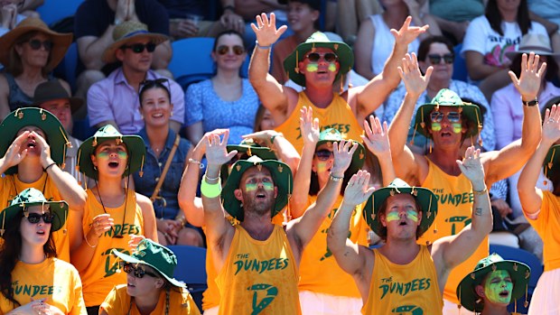 Fans of Kimberly Birrell of Australia cheer at Melbourne Park.